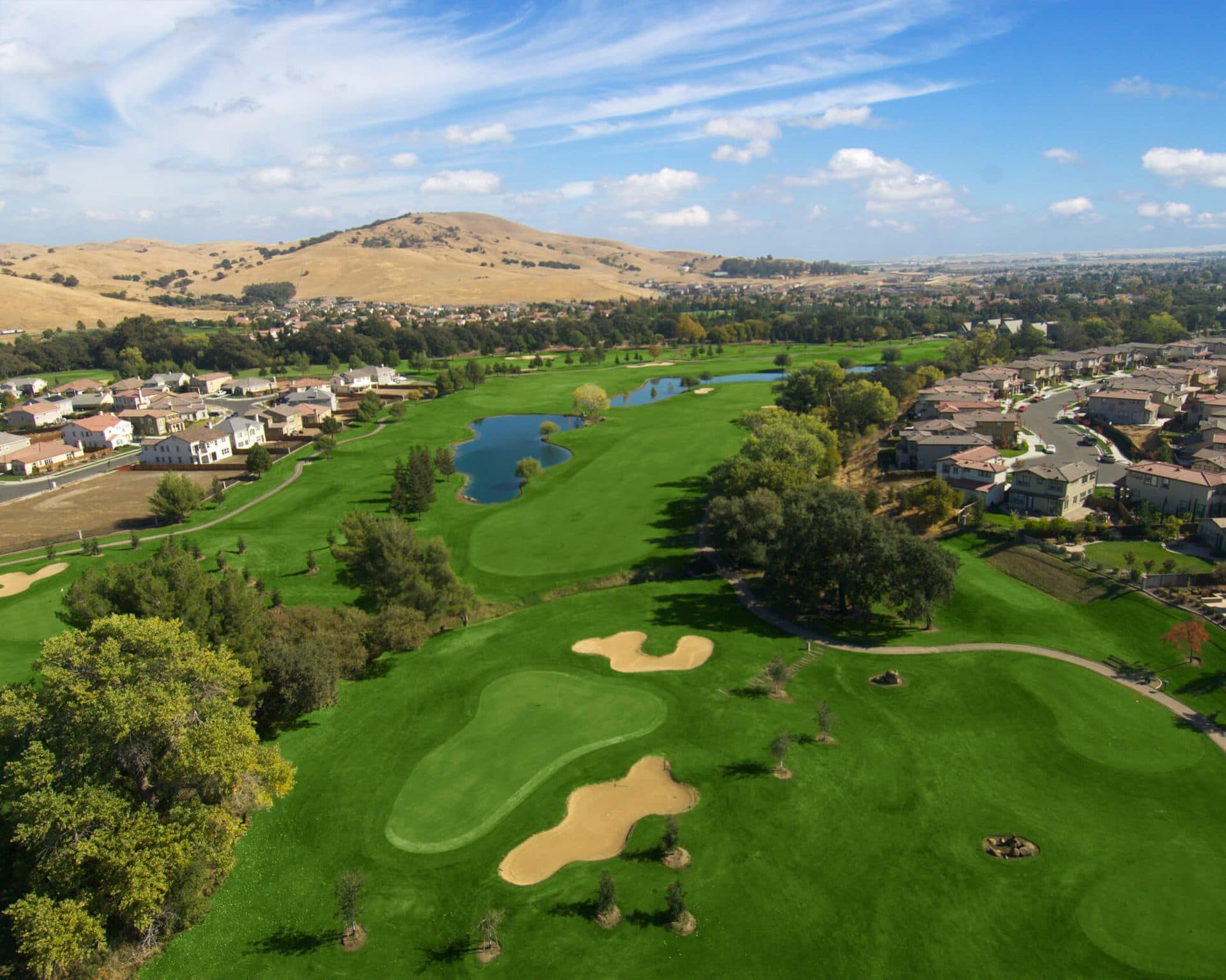 On-course view of Paradise Valley Golf Course: Hole 2 and lakeside playing greens.
