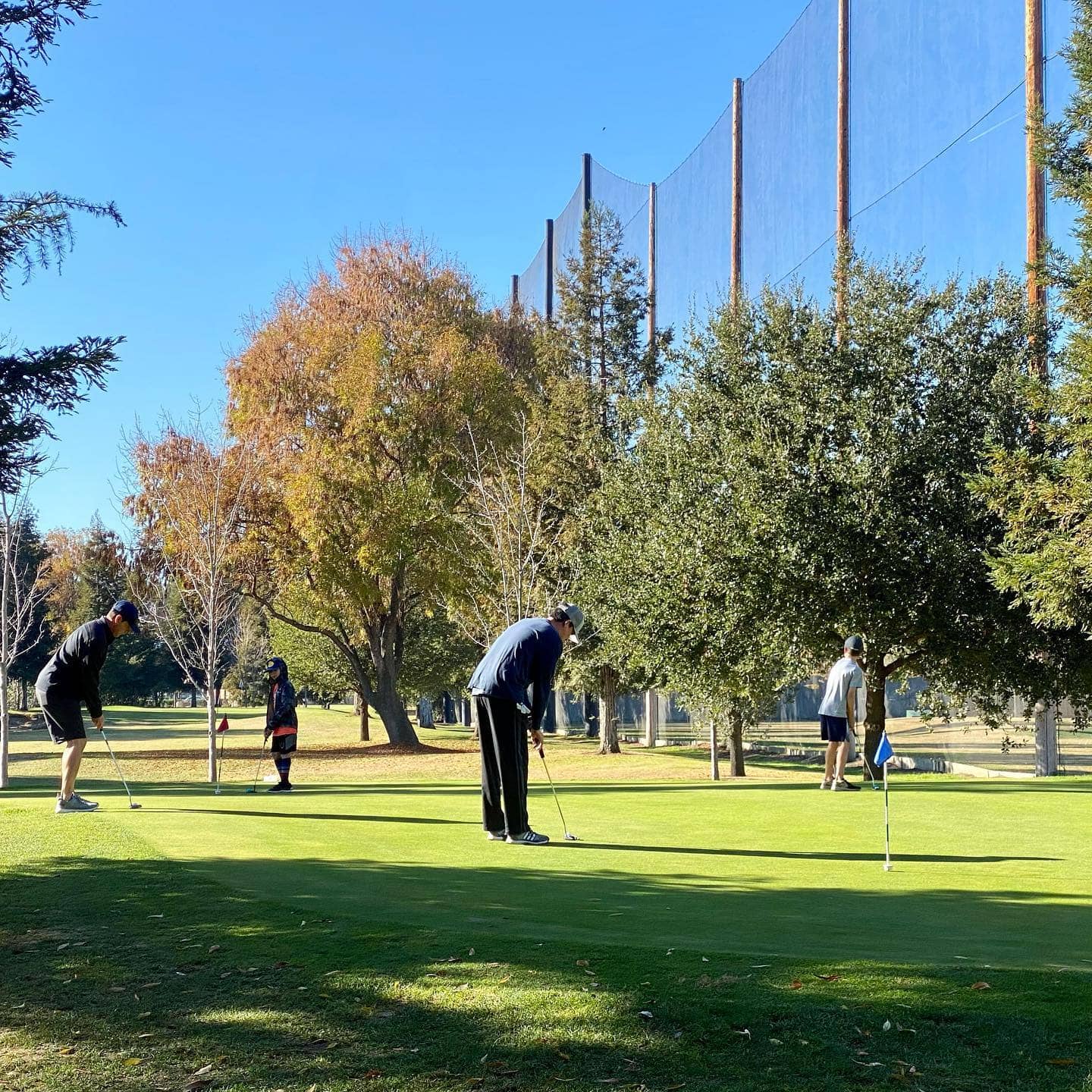 Golfers putting on the green at Pruneridge Golf Club in Santa Clara, CA. Photo credit: Pruneridge Golf Club (official website, pruneridgegolfclub.com).